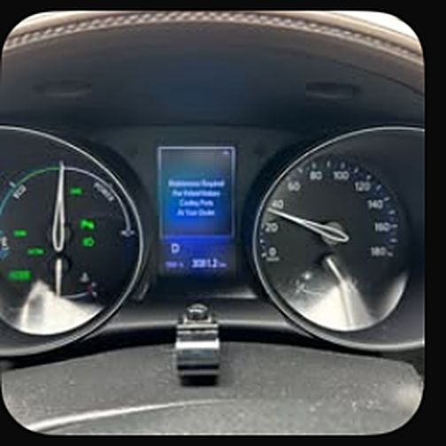 Dashboard showing hybrid system cooling warning